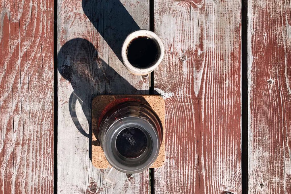 A mug and carafe full of coffee.