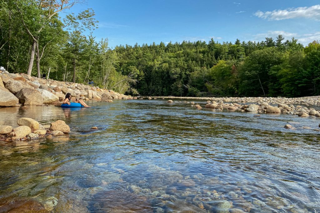 A woman tubes the Glen river at Yogi Bear's Jellystone: Glen Ellis in Glen, New Hampshire.