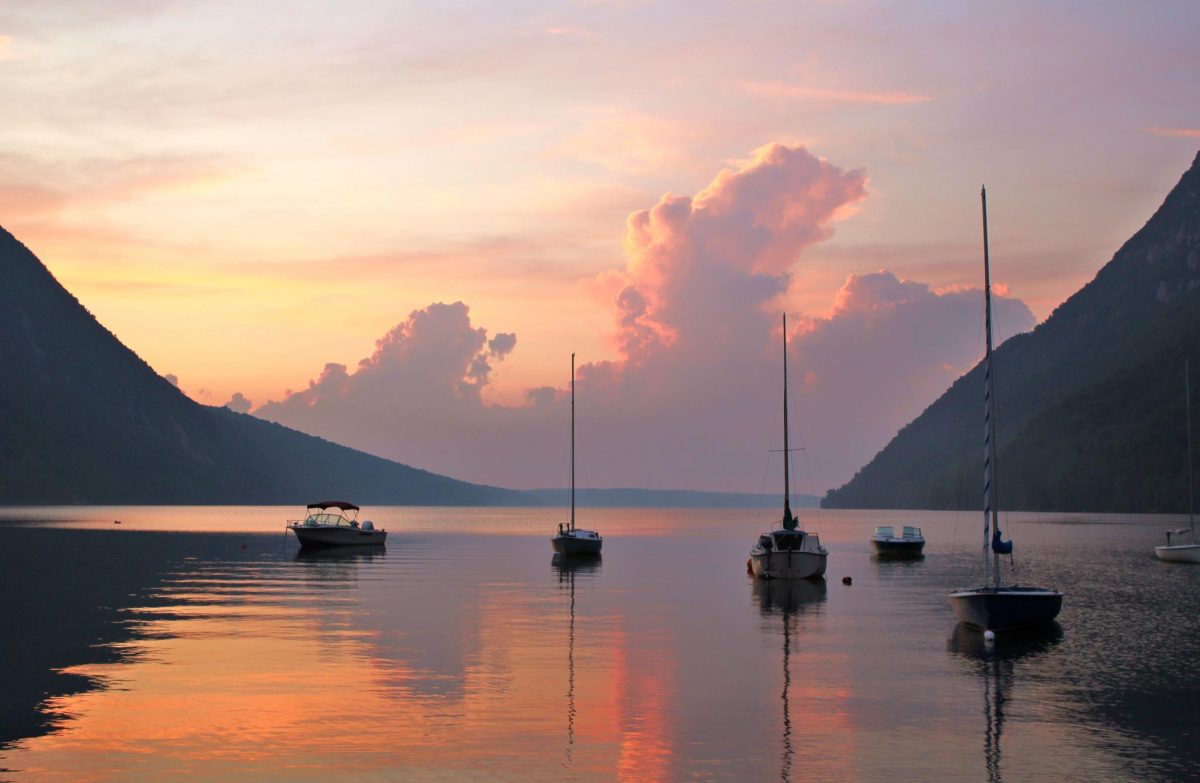 Sailboats between Mount Pisgah and Mount Hor with a pink sunset.