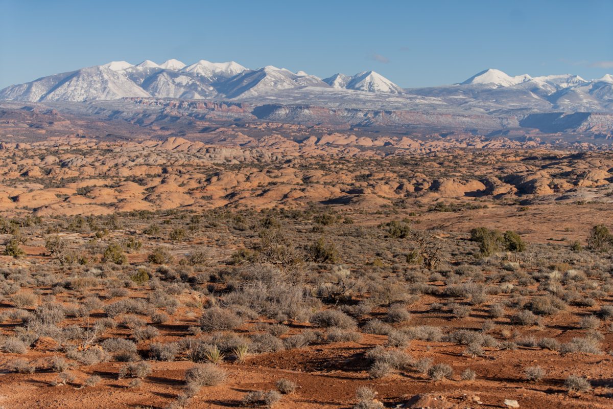 Arches National Park petrified sand dunes are seen in front of the La Sal mountain range in Moab, Utah.