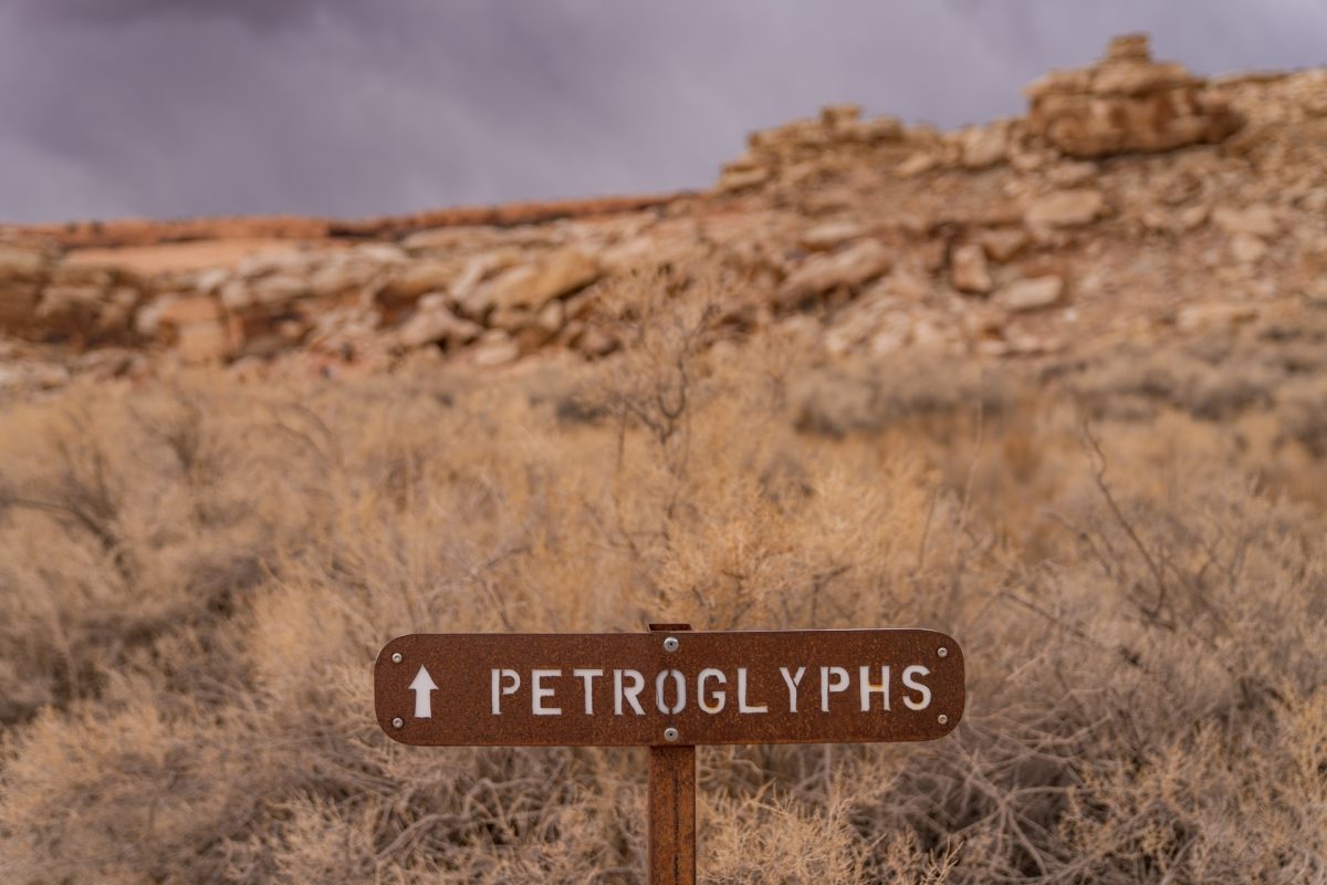 A sign pointing toward the Ute art panel along the Delicate Arch trail in Arches National Park in Moab, Utah. 