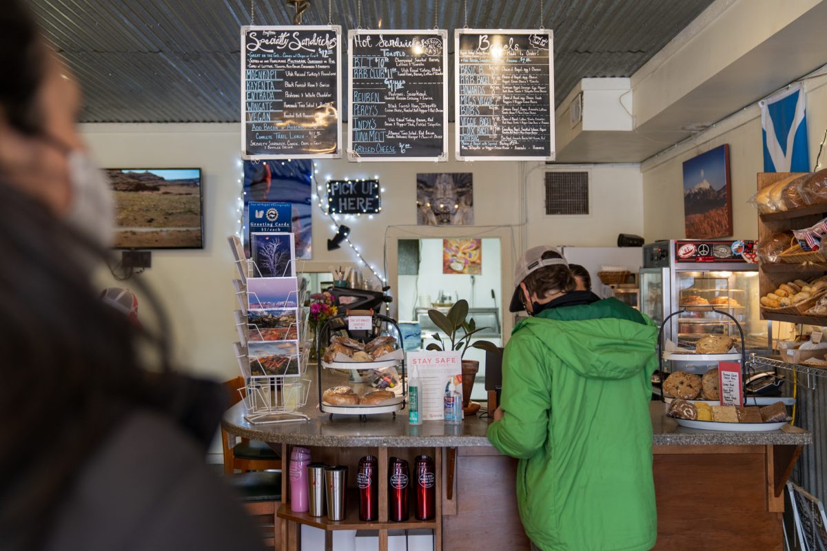 A person waits in line while someone is ordering food at the Redrock Bakery and Cafe in Moab, Utah.