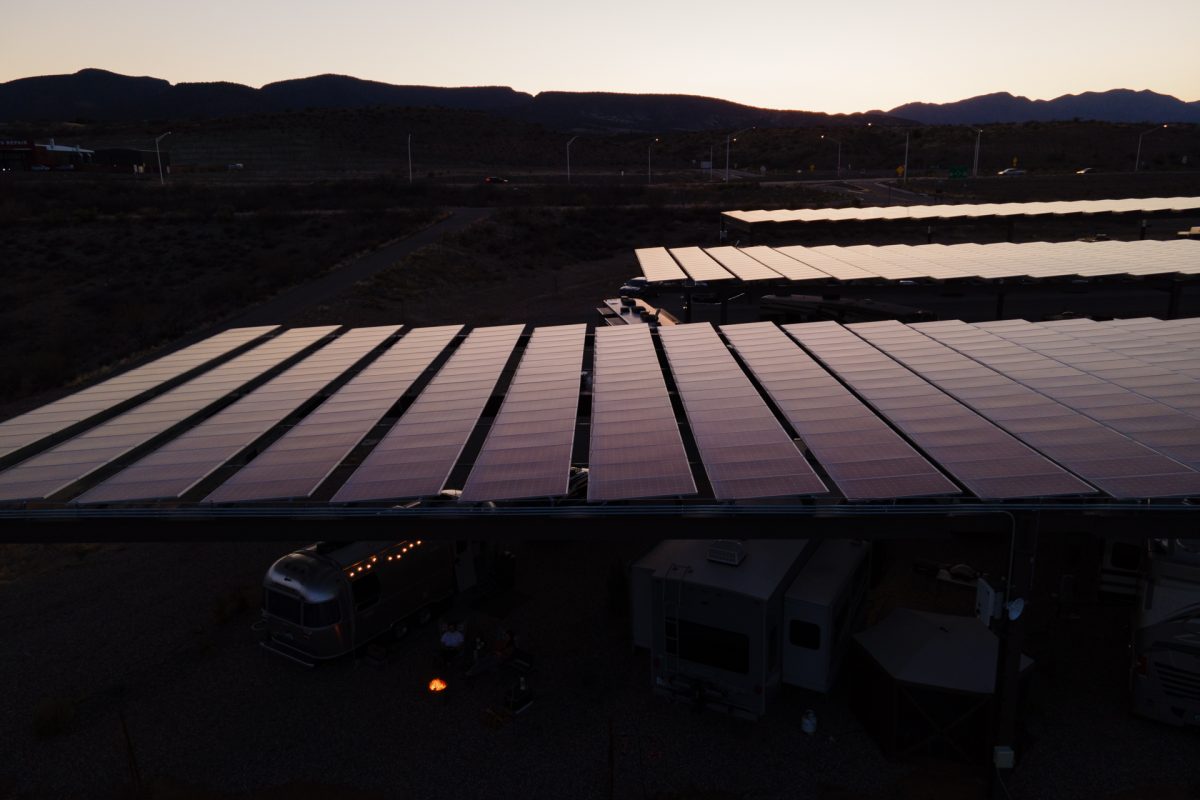 The sun goes down on solar panels at Verde Ranch RV Resort in Camp Verde, Arizona.