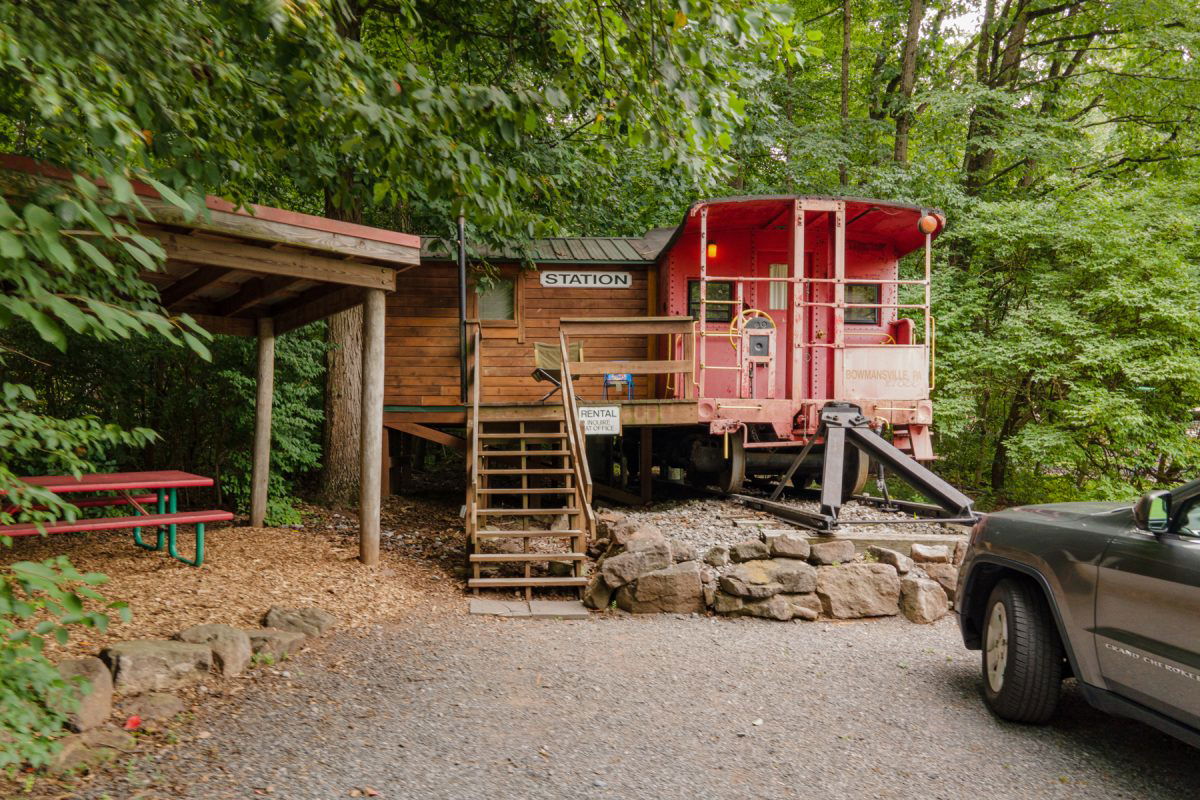 Train Caboose glamping lodge in the woods at Lake in Wood RV Resort