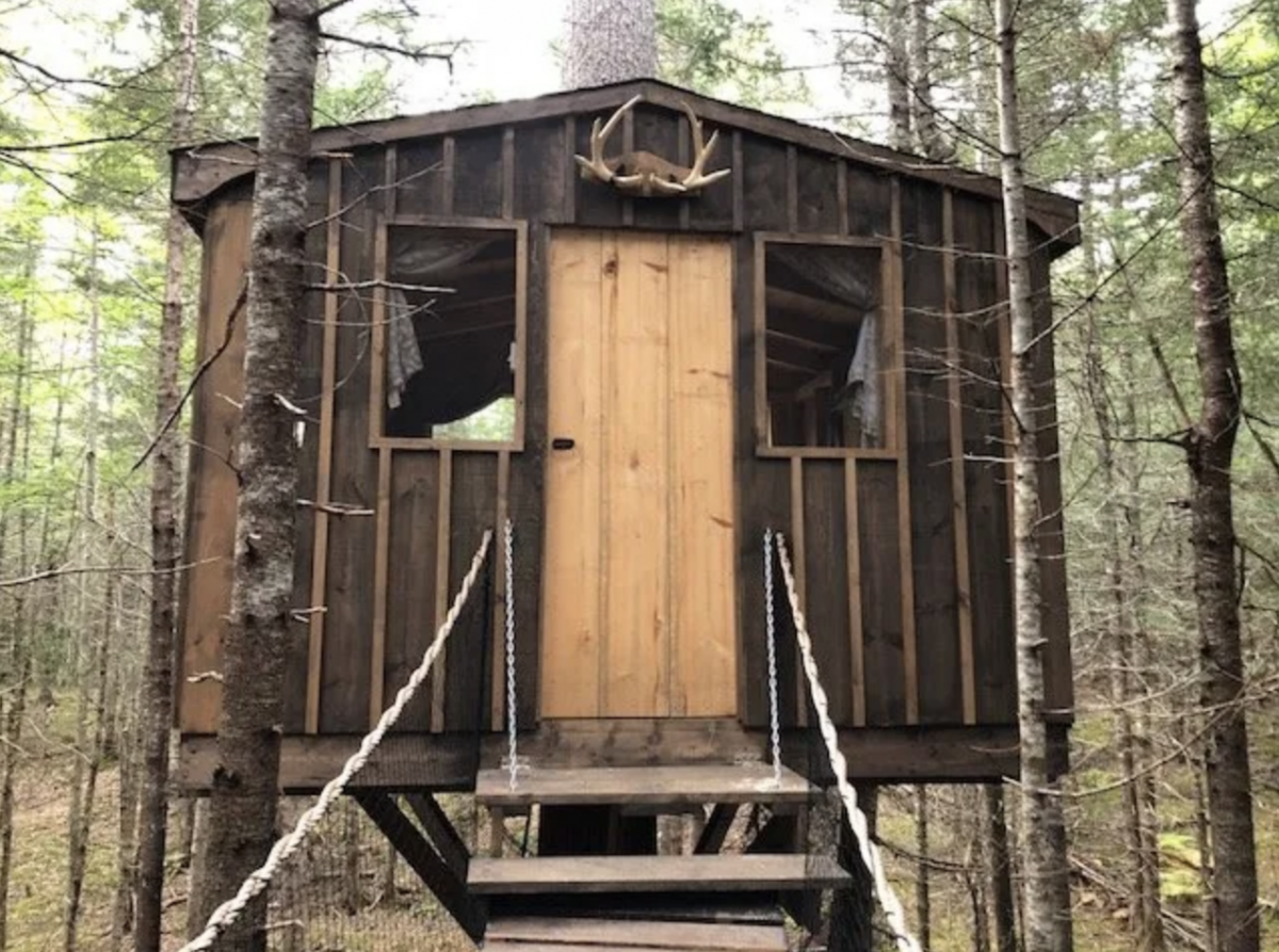 Treehouse in the woods at Cottonwood Camping and RV Park in ME.