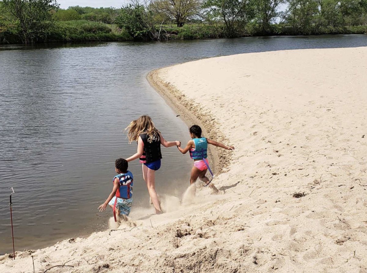 Kids on the water at Fisher's Cove RV Park.