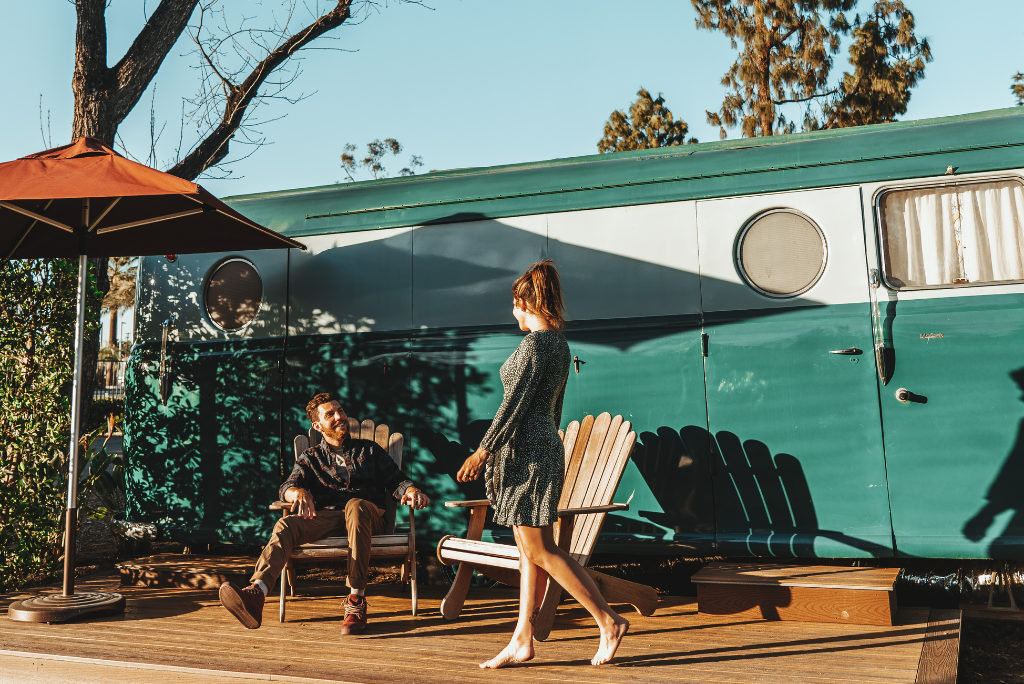 Jordan Kahana in front of vintage airstream rental at Launch Pointe in California. 