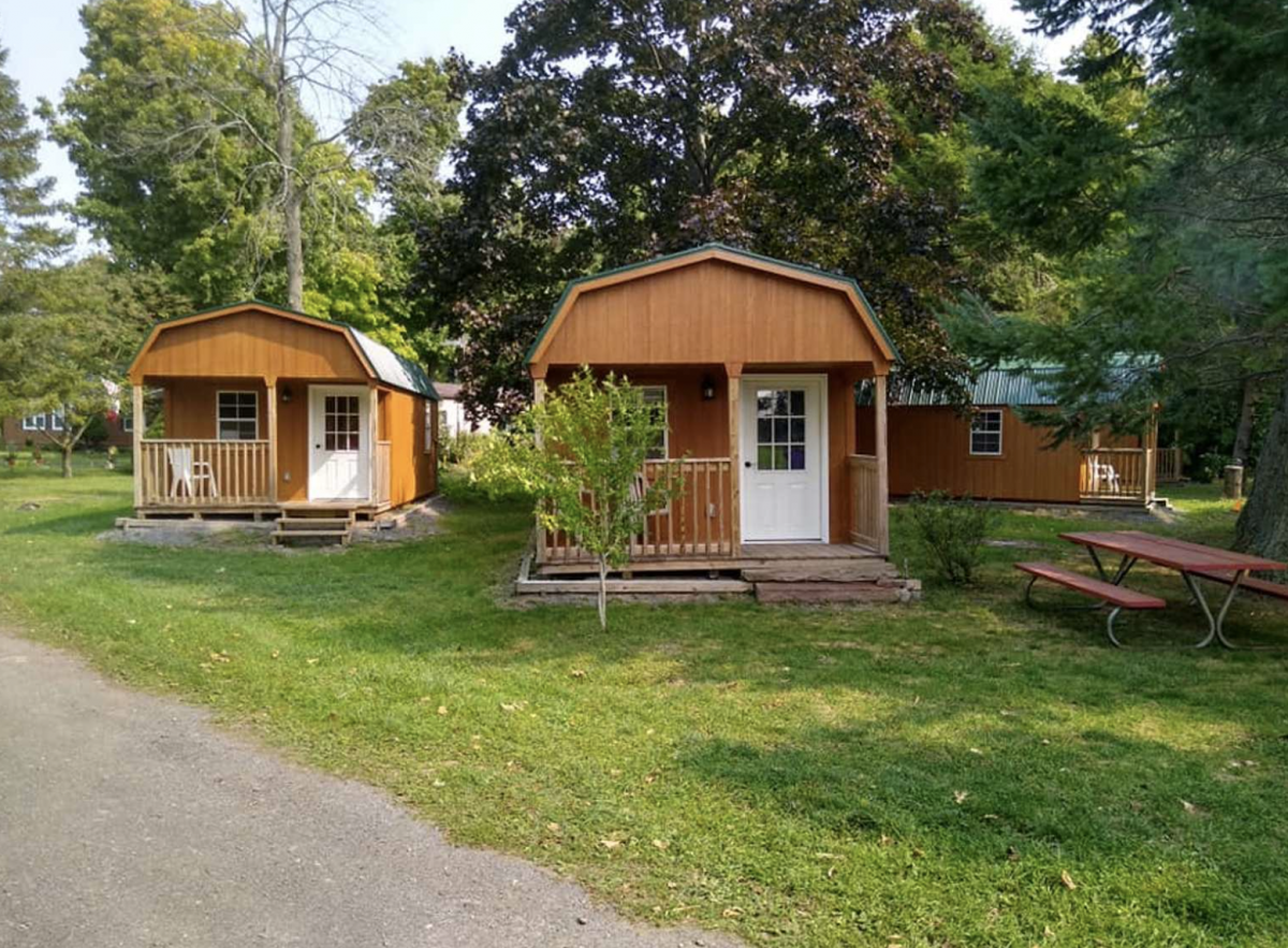 Cabins in the woods at Niagara Shores Campground.