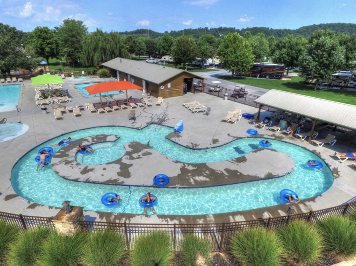 Lazy River with people floating I blue tubes at Sun Outdoors Piegon Forge.