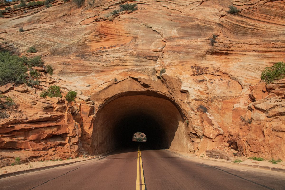 A road leading into a tunnel at Zion National Park in Utah.