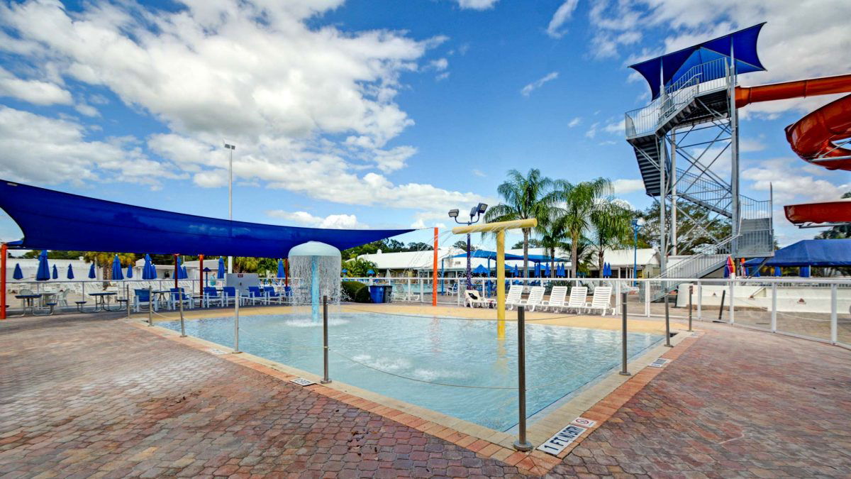 Outdoor pool area with slides at Sun-N-Fun in Florida. 