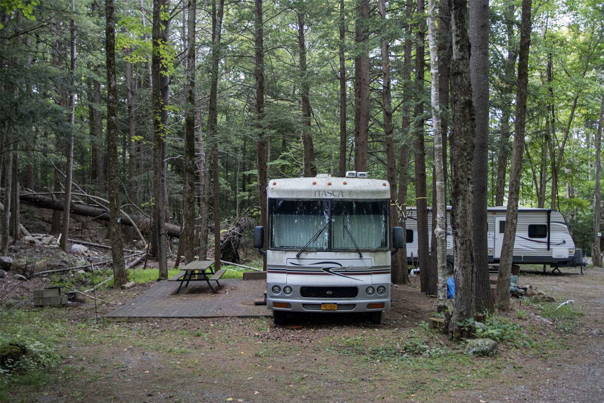 RV at wooded site in Ticonderoga, New York