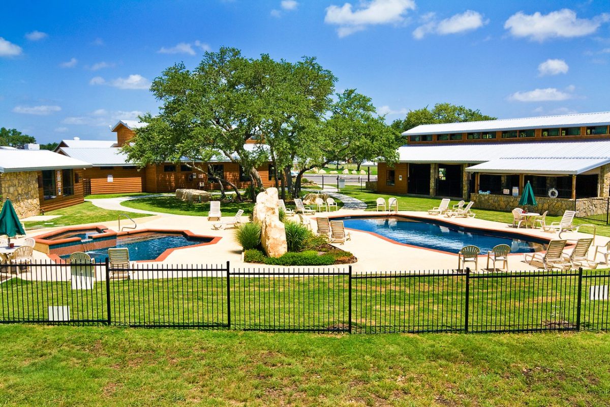 The pool area at La Hacienda RV Resort in Austin, Texas.