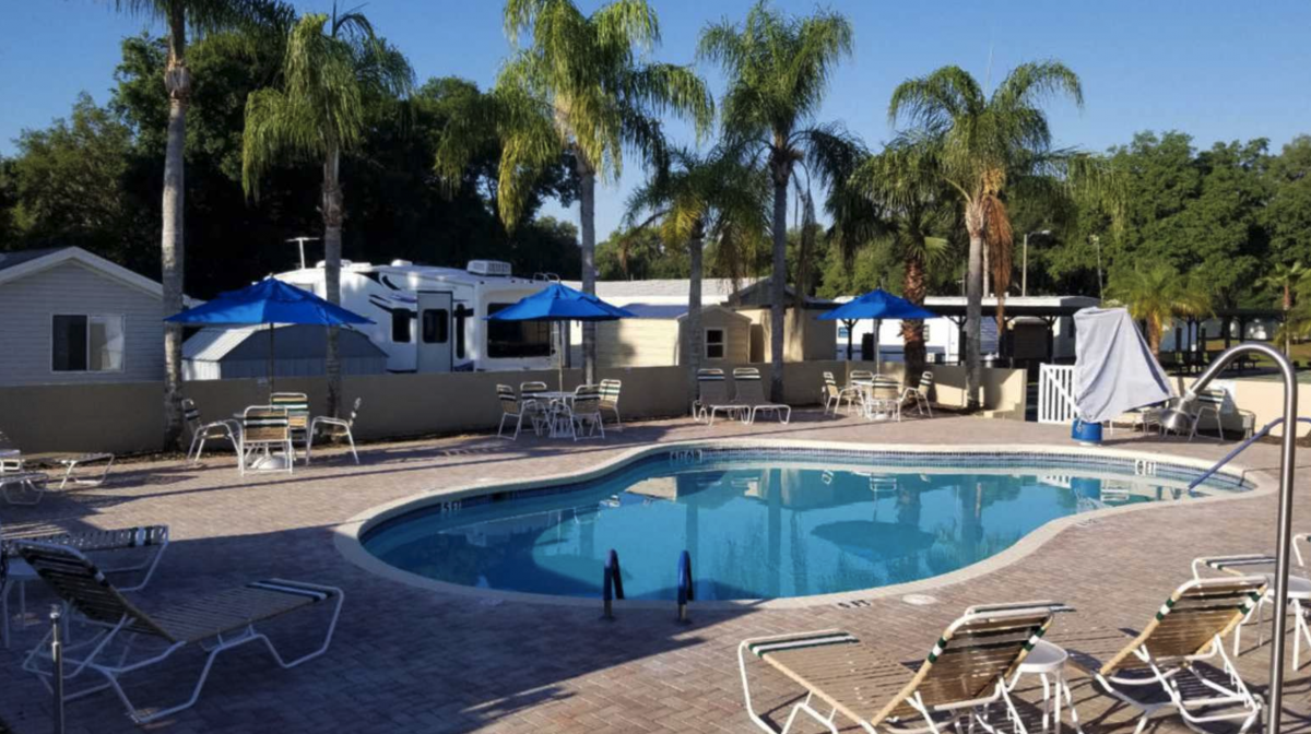 The pool area of Glen Haven RV Resort (55+) in Zephyrhills, Florida