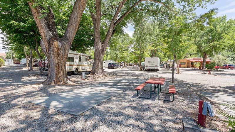 An empty RV site in the Canyonlands RV Resort & Campground in Moab, Utah.