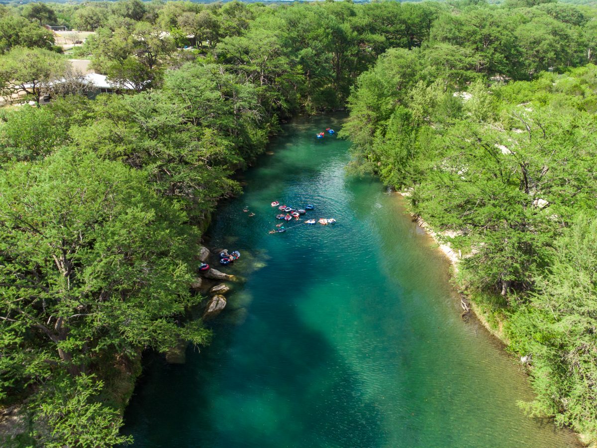 Tubers in the Frio River along Riverbend on the Frio in Concan, Texas. 