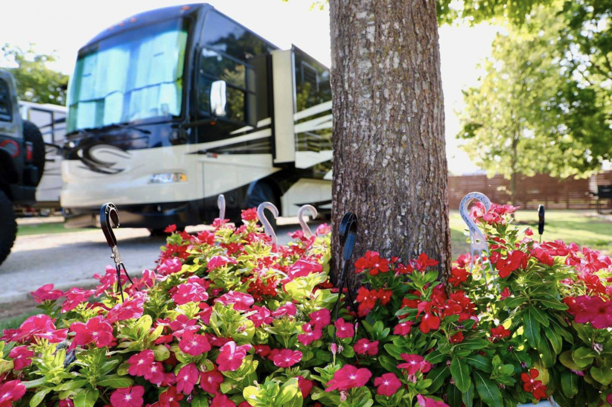 A motorhome parked at a campsite at Austin RV Park in Austin, Texas.