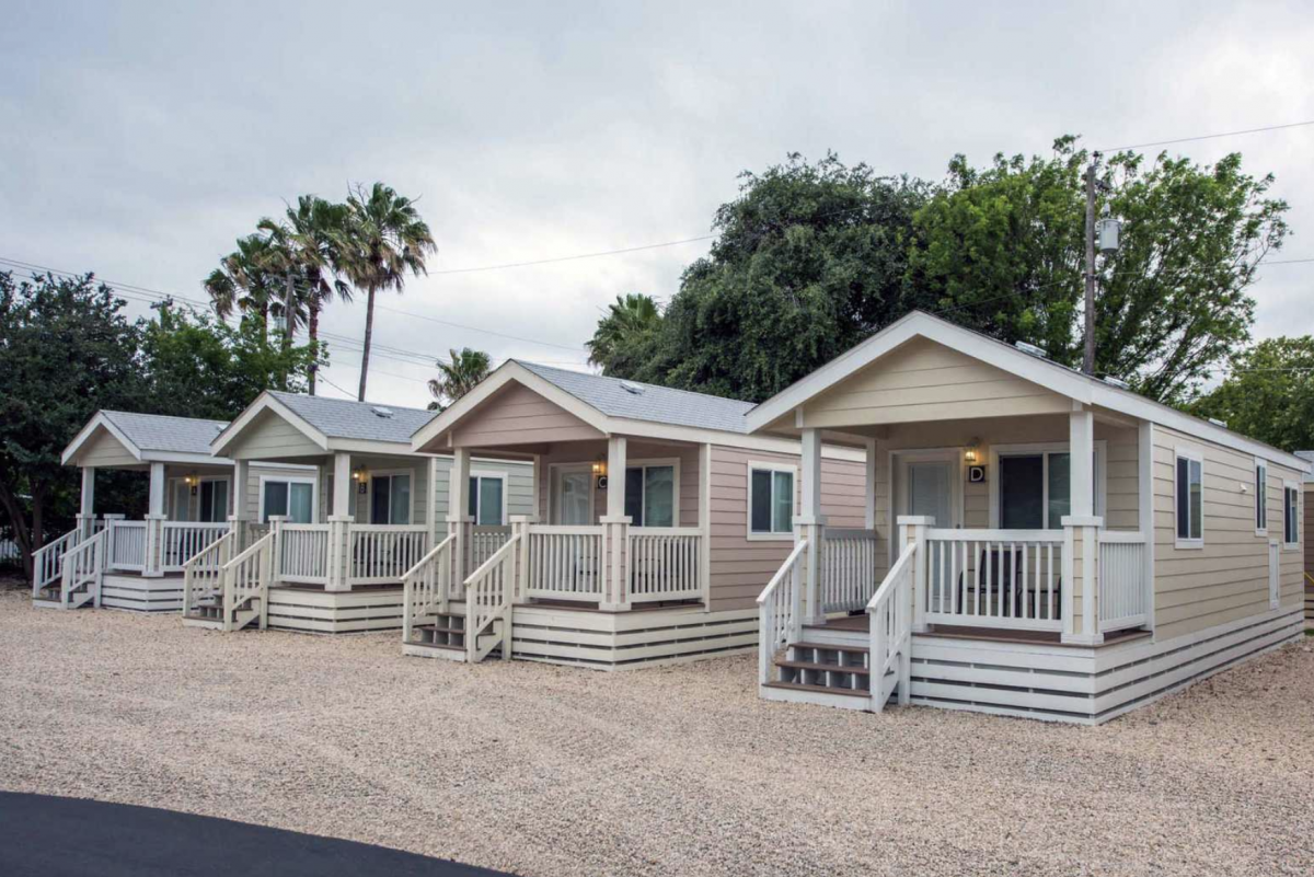 The cottage and cabin rentals at Traveler's World RV Resort in San Antonio, Texas.