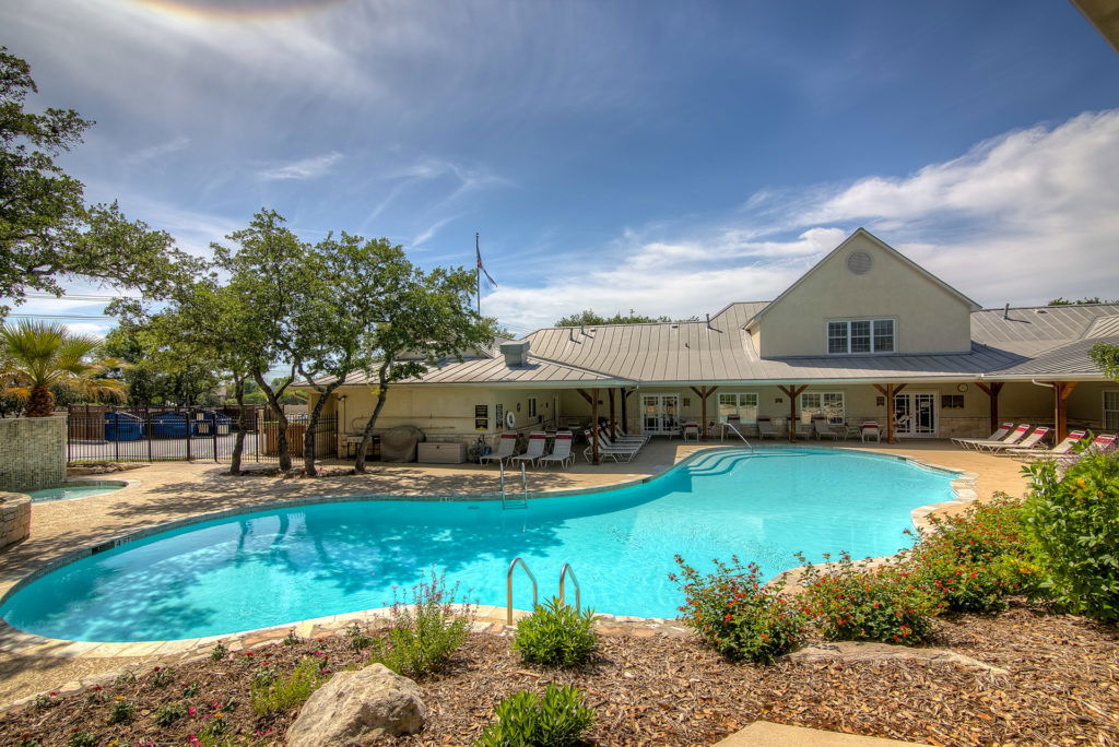 The pool and clubhouse at Blazing Star RV Resort in San Antonio, Texas.