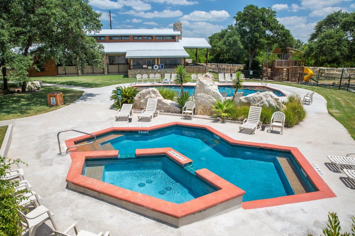 The pool and relaxation area at La Hacienda RV Resort in Austin, Texas.