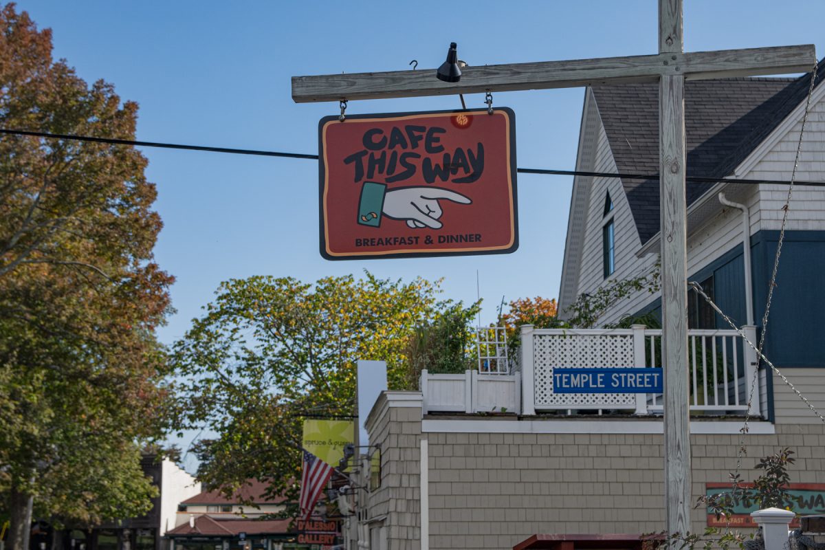 The street sign of Cafe This Way in downtown Bar Harbor, Maine.