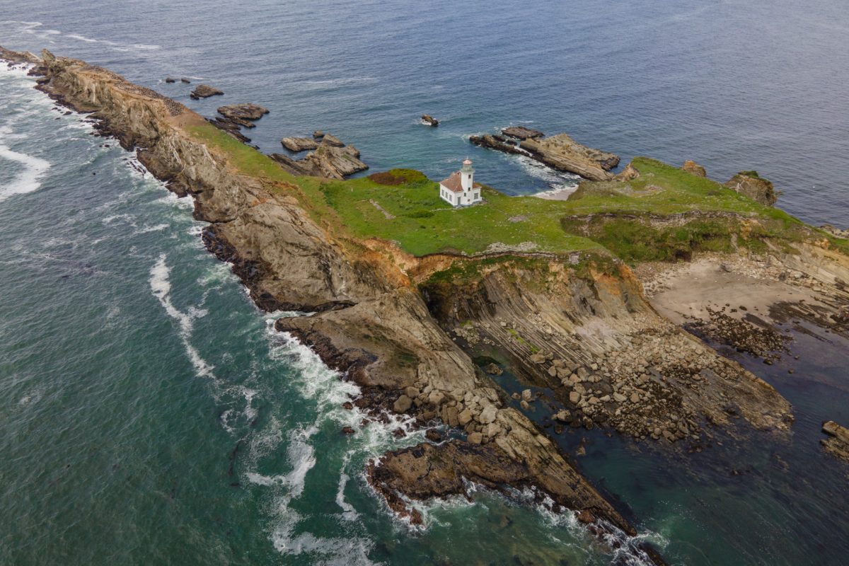 On a secluded little island sits the Cape Arago Lighthouse on the Pacific Shore of Oregon.