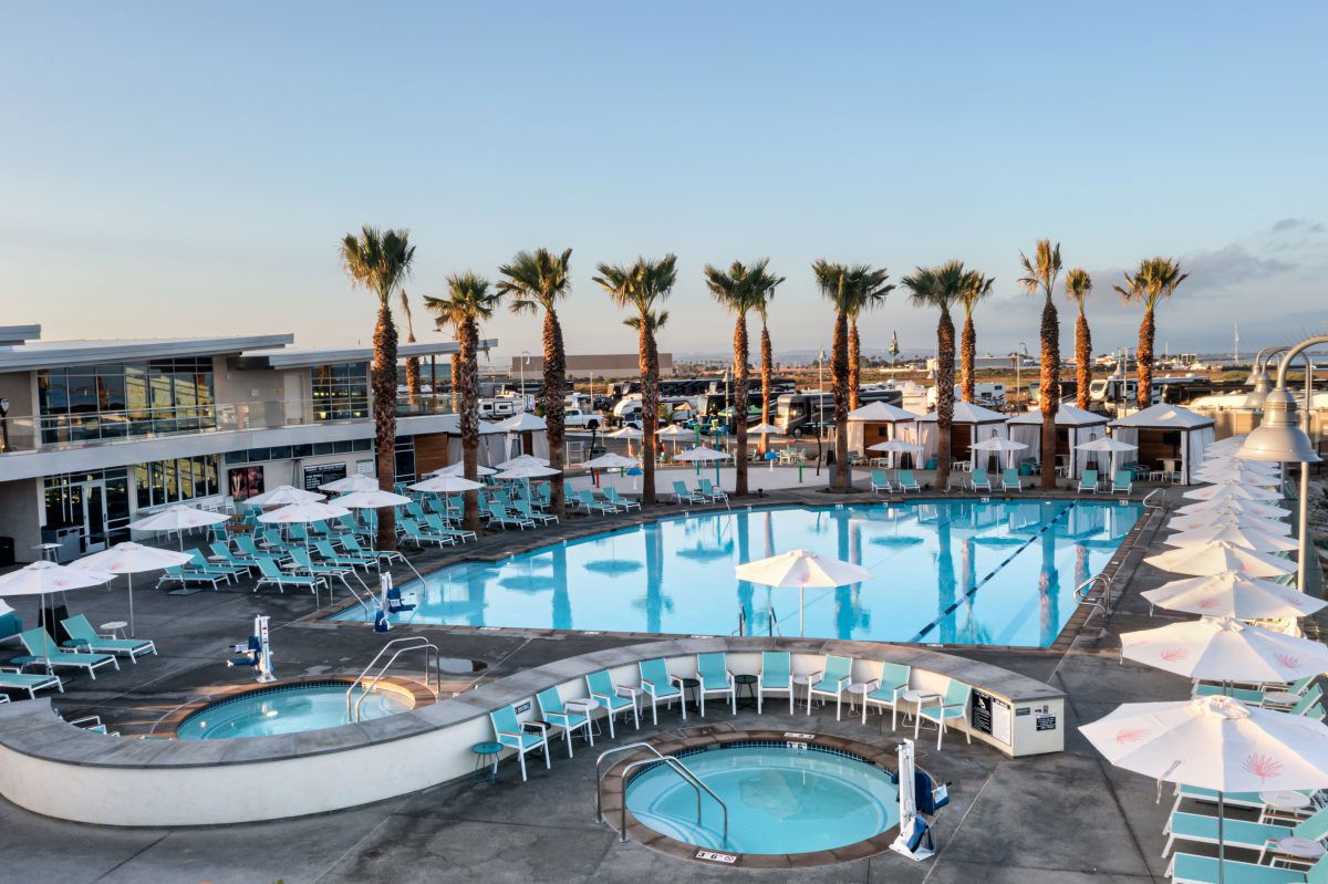 Pool, hot tub, and cabanas at Sun Outdoors San Diego Bat in CA