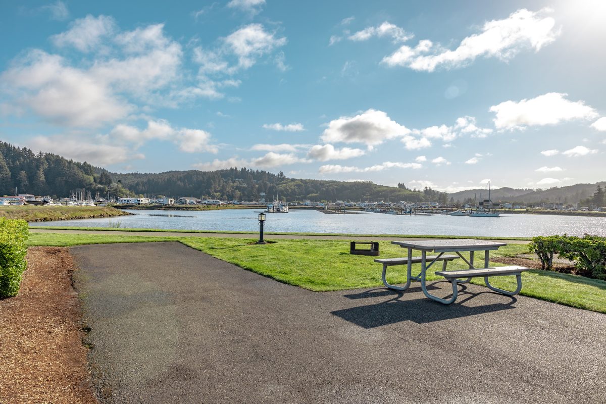 A waterfront RV site at Winchester Bay RV Resort in Winchester Bay, Oregon.