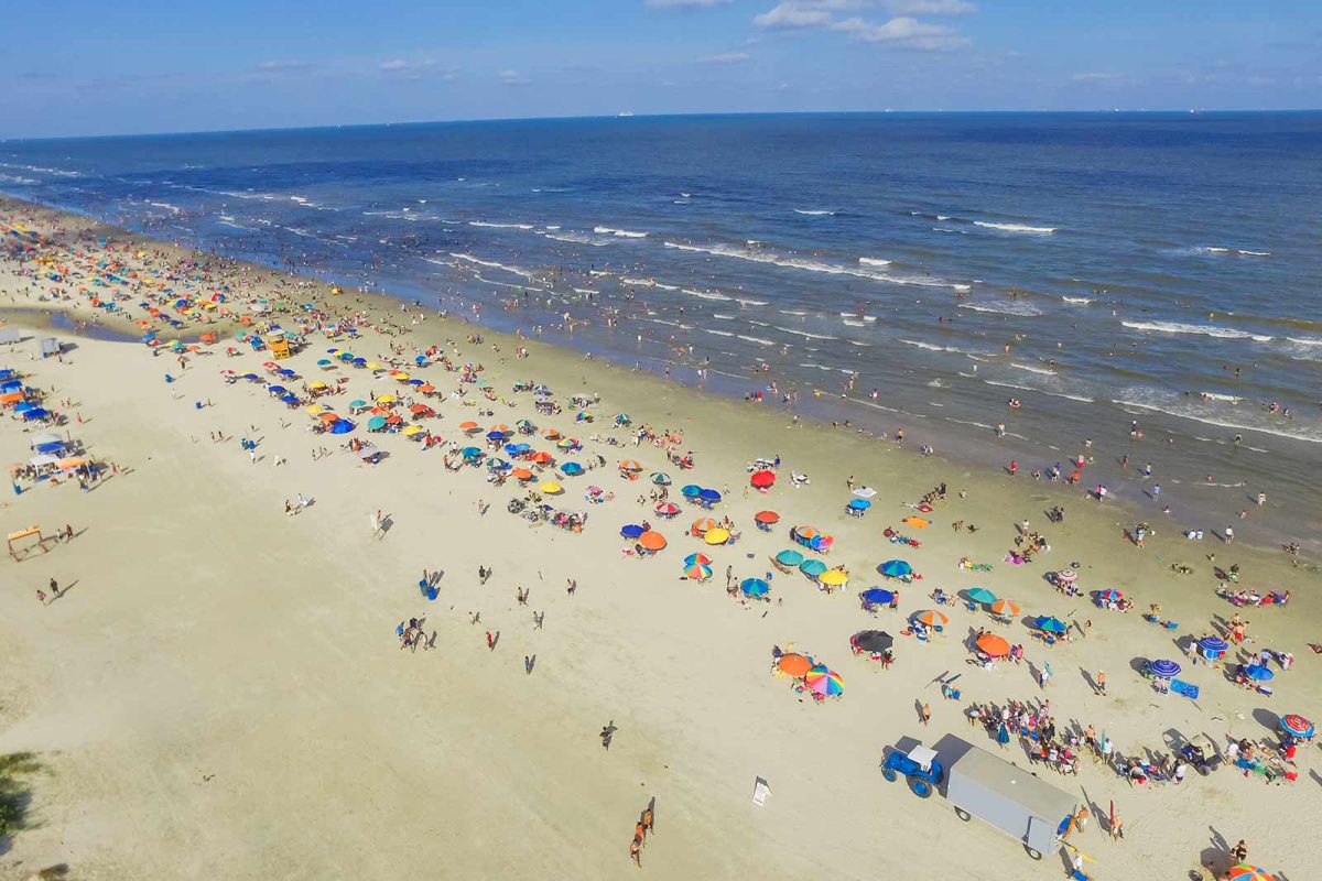 Hundreds of colorful umbrellas at Surfside Beach, south of Houston. 