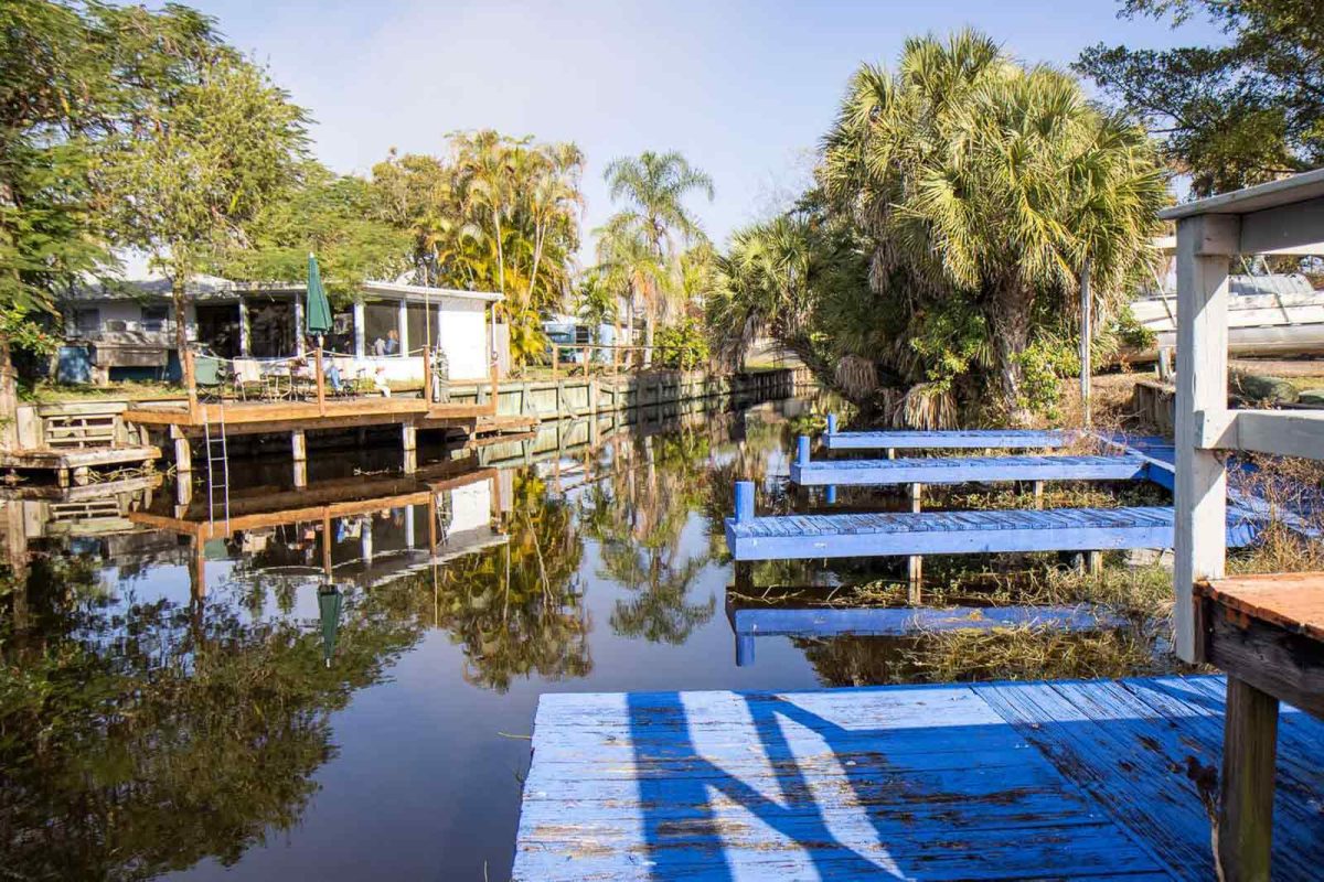 Blue docks on the water at J&S Fish Camp. 