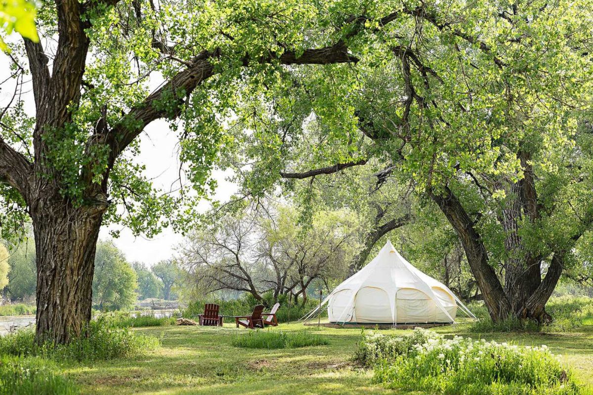 yurt nestled among trees within the Platte River Fort Resort and Event Center