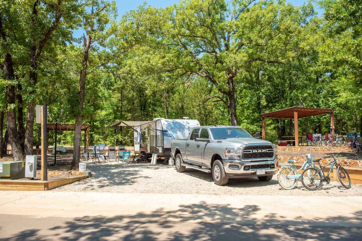 truck pulling RV at campground