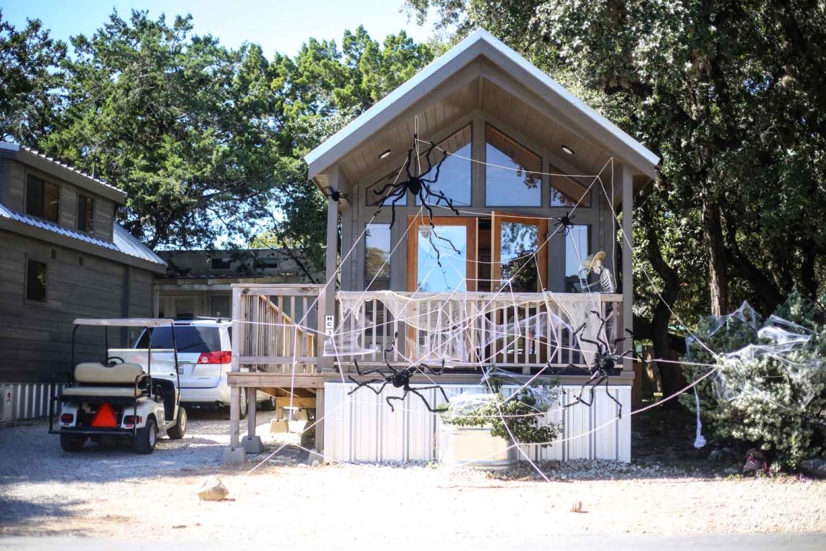 Campground cabin covered in Halloween decorations