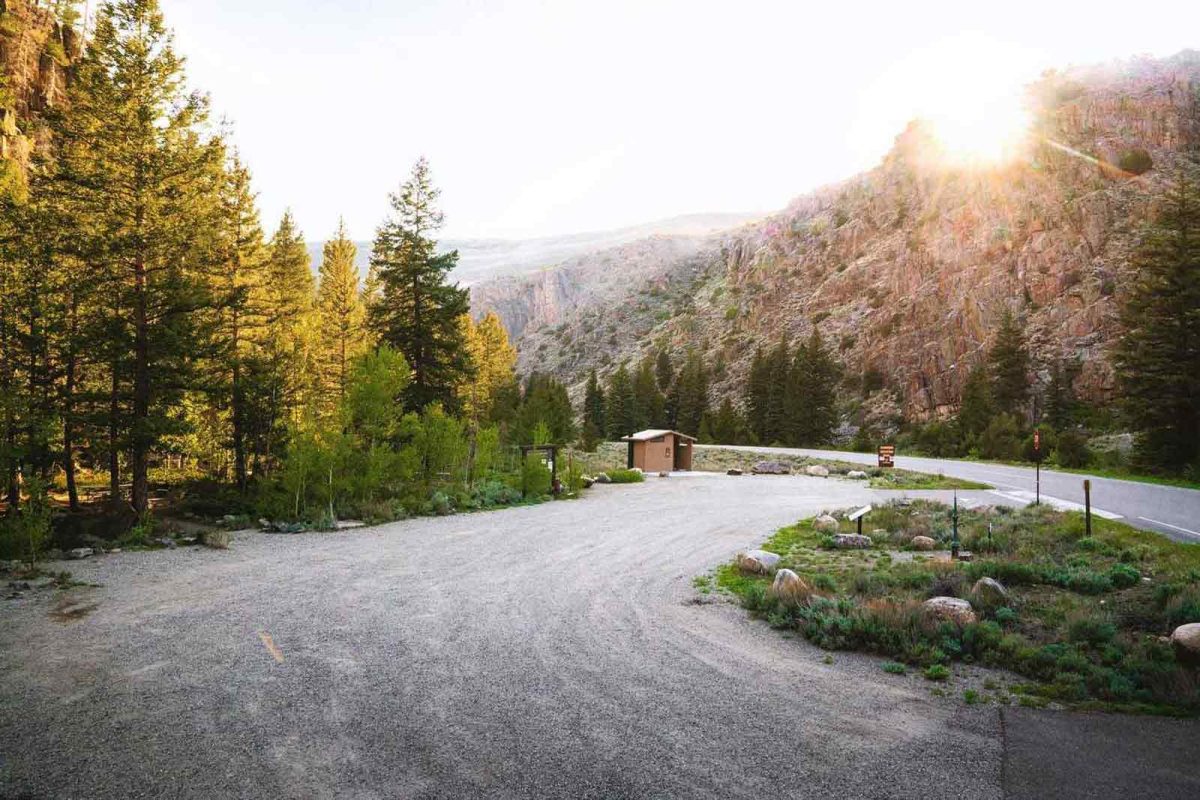 Trees and mountainside at Campfire Ranch on the Taylor, one of the best places to see fall foliage. 