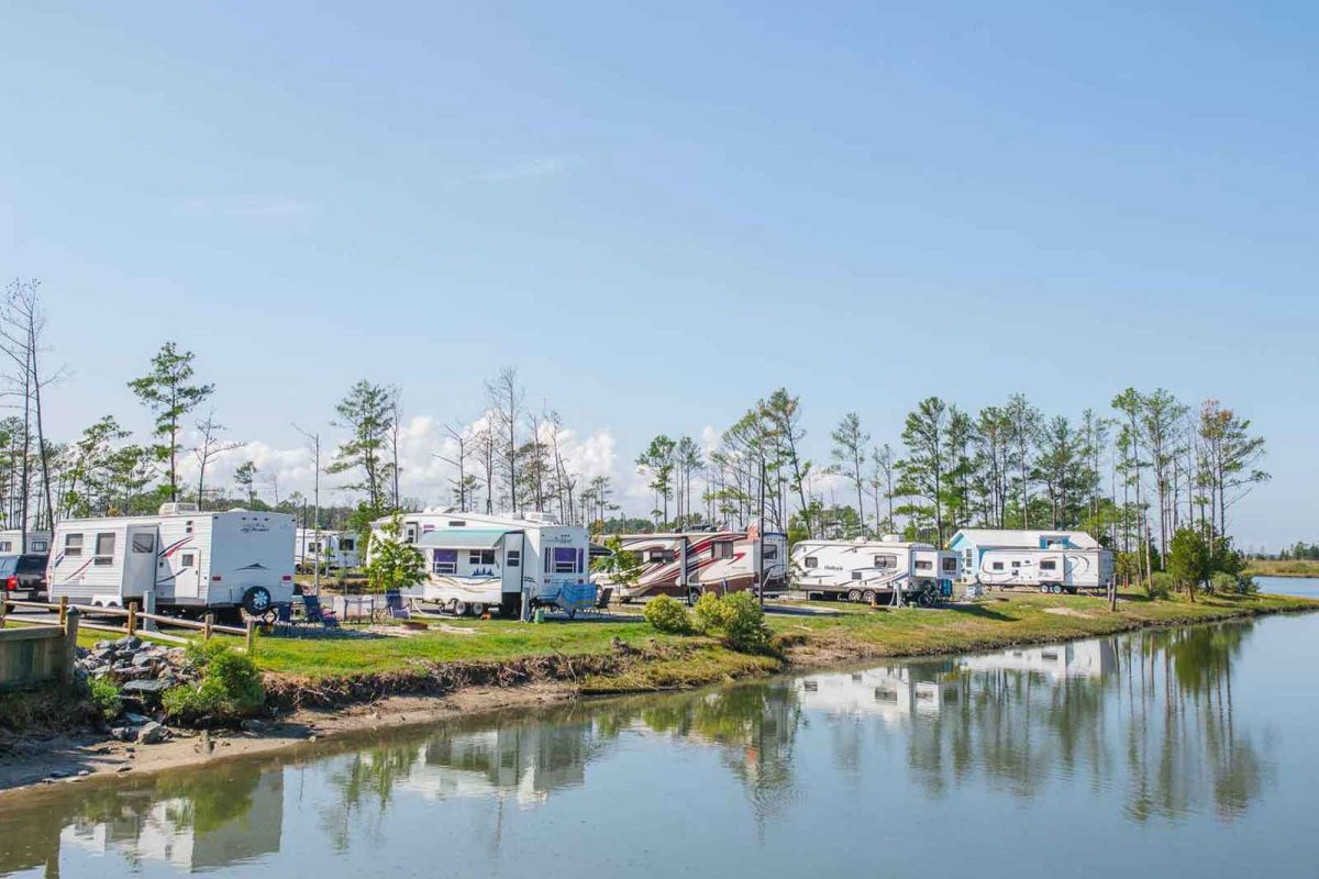 RV sites along the water at Sun Outdoors Rehoboth Bay. 