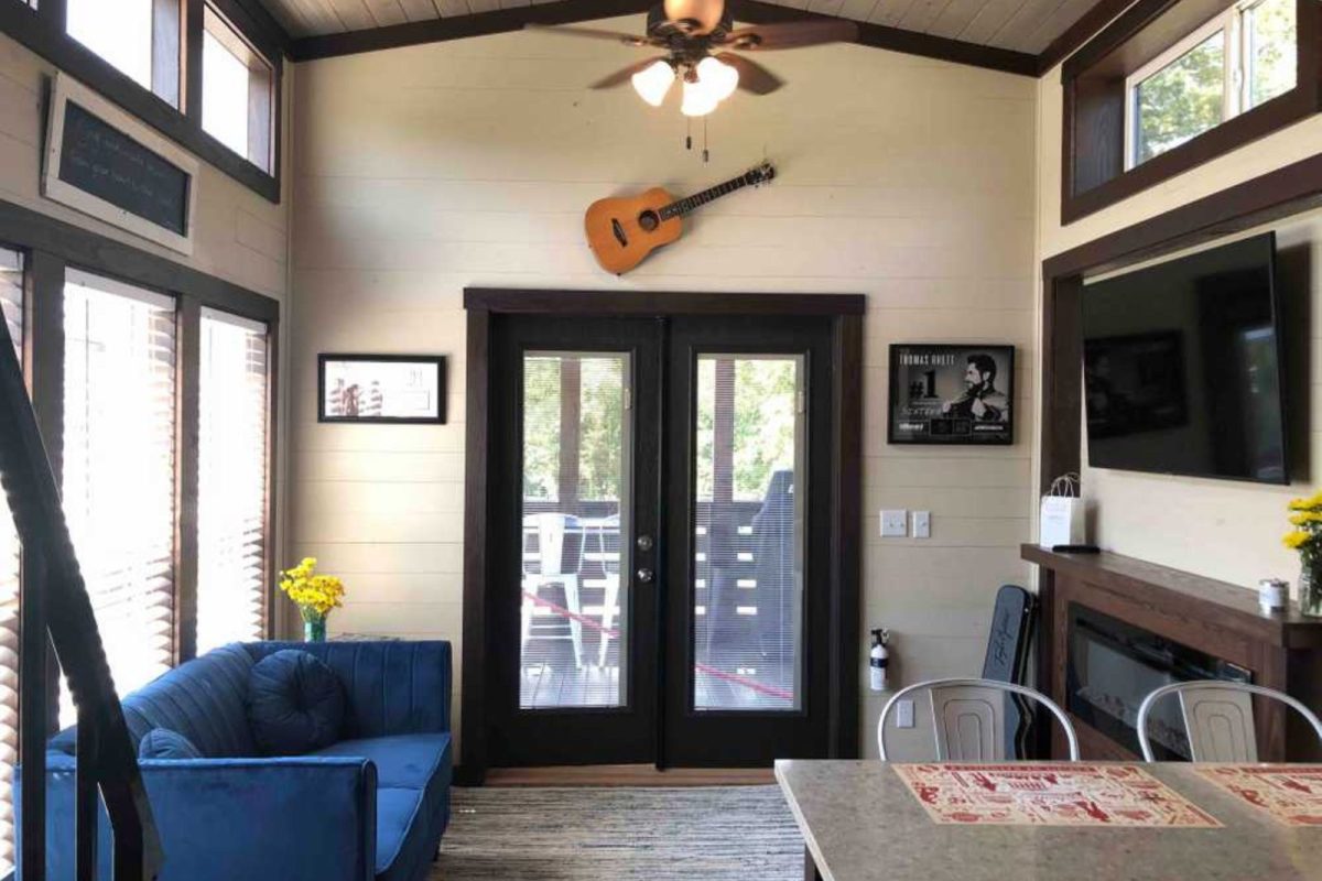 A living room in a tiny home at Piney River Resort 