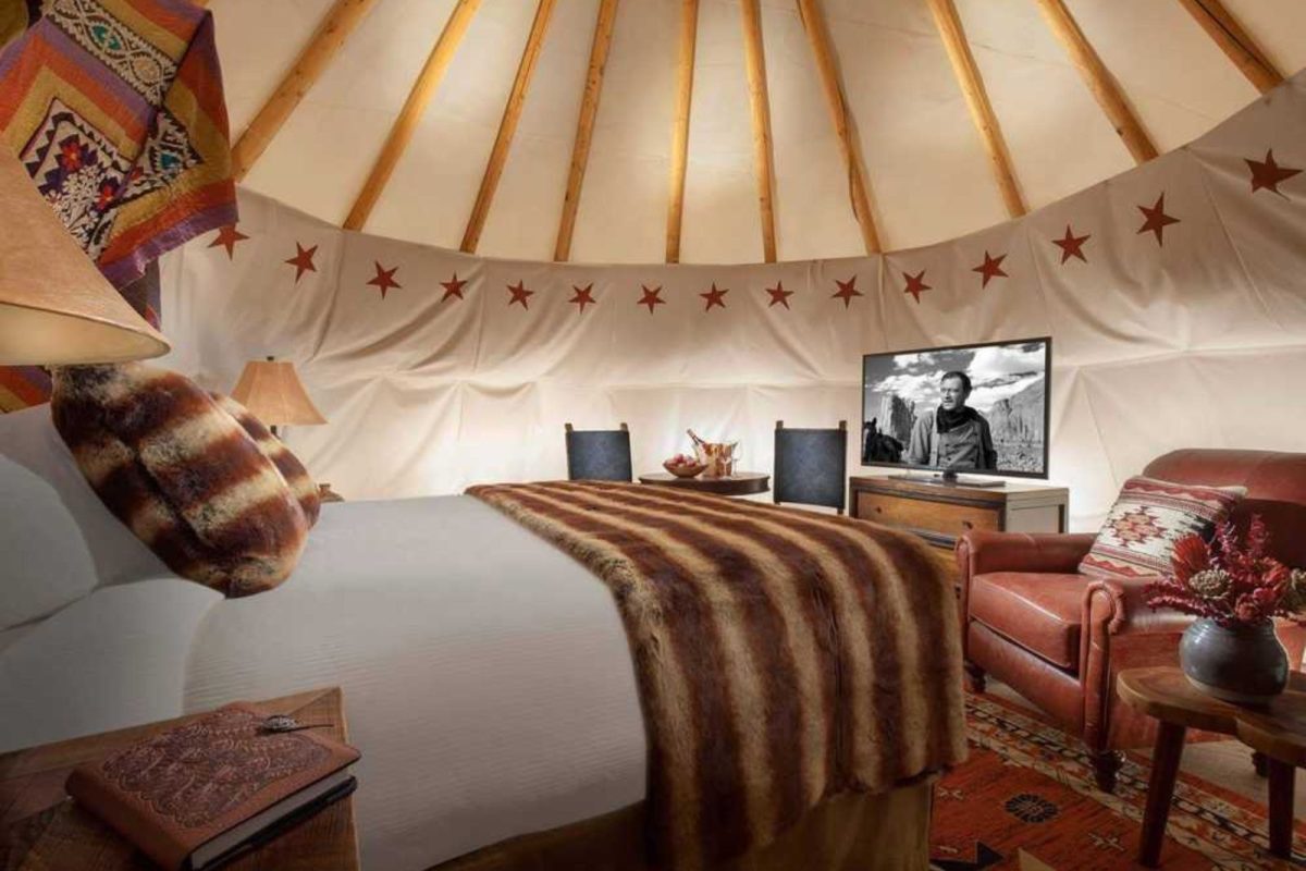 bed and decor inside tipi at campground near Galtinburg, TN