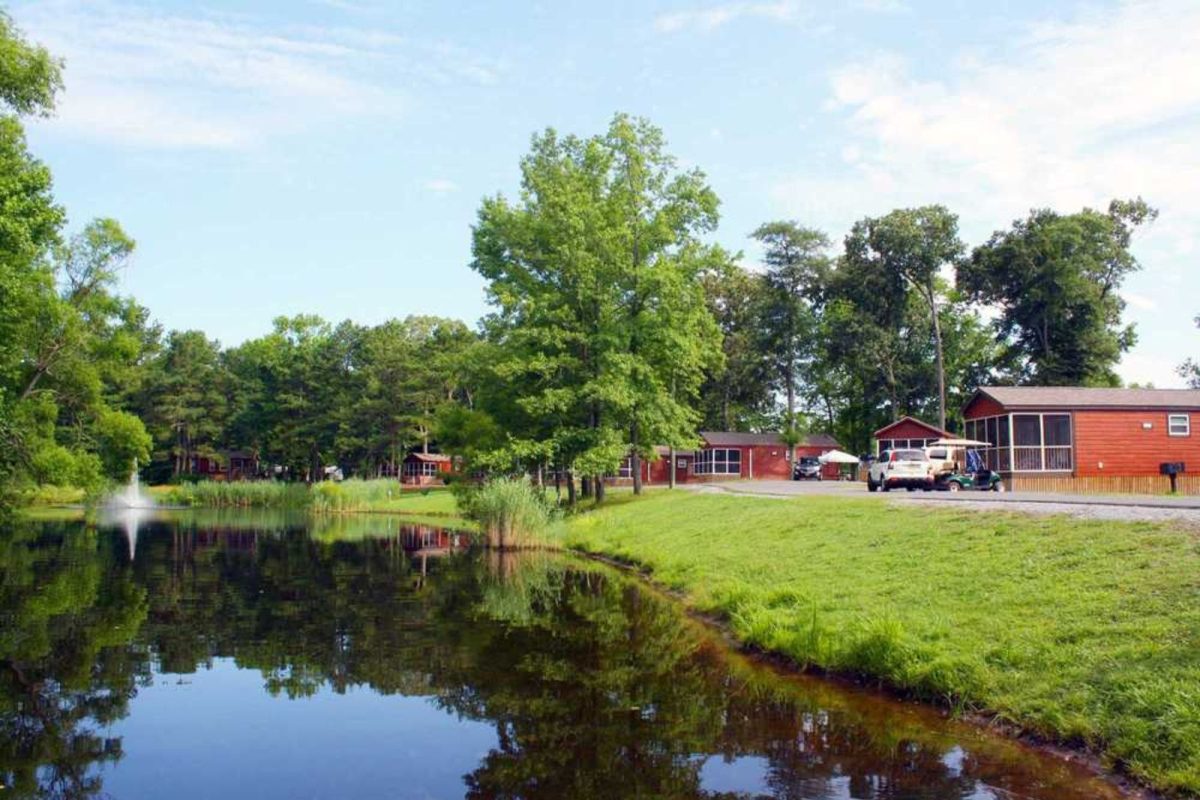 campground near Ocean City, MD, with lake and red cabins