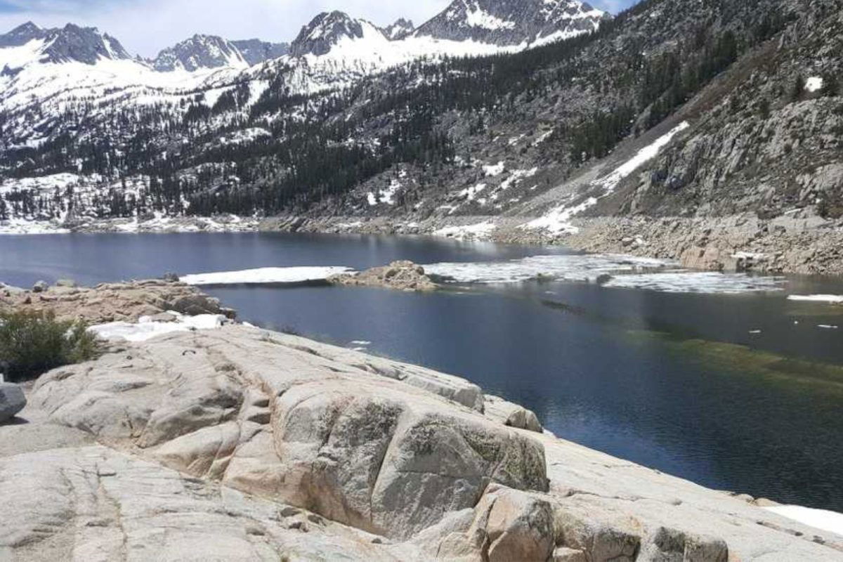 creek by snowy mountains