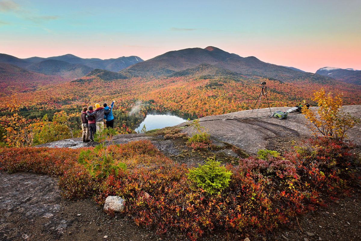 family taking photo at one of the best places to camp, the Adirondacks