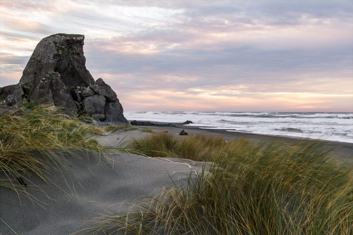 cliff by the beach in Oregon, one of the best places to camp