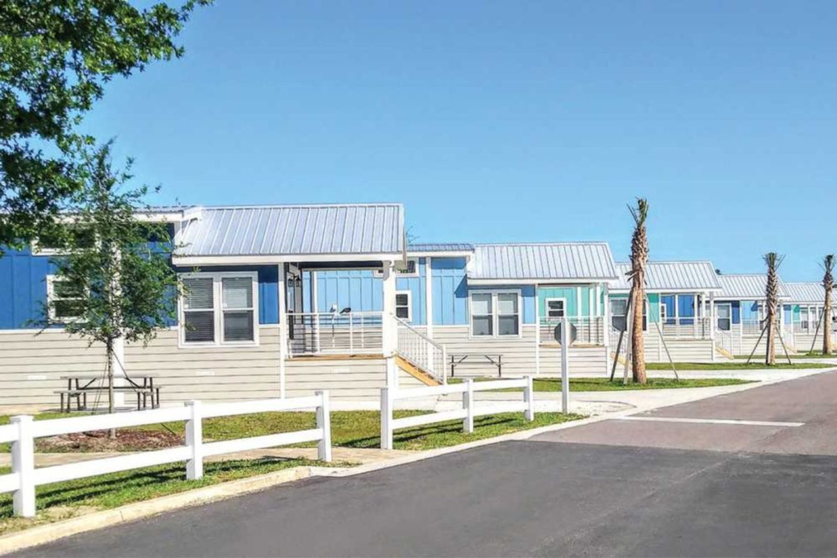 multi-colored cabins in a row at a campground near Jacksonville, FL