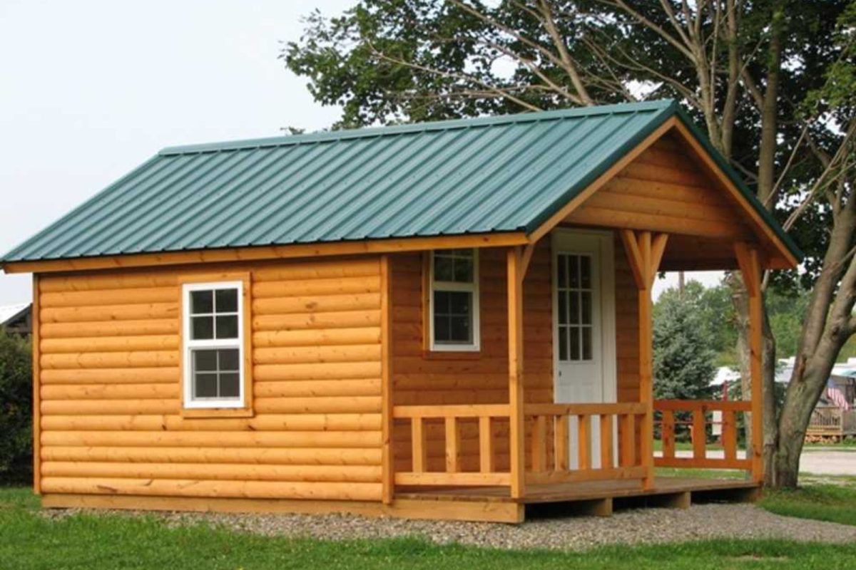 cabin with green roof at campground near Rochester