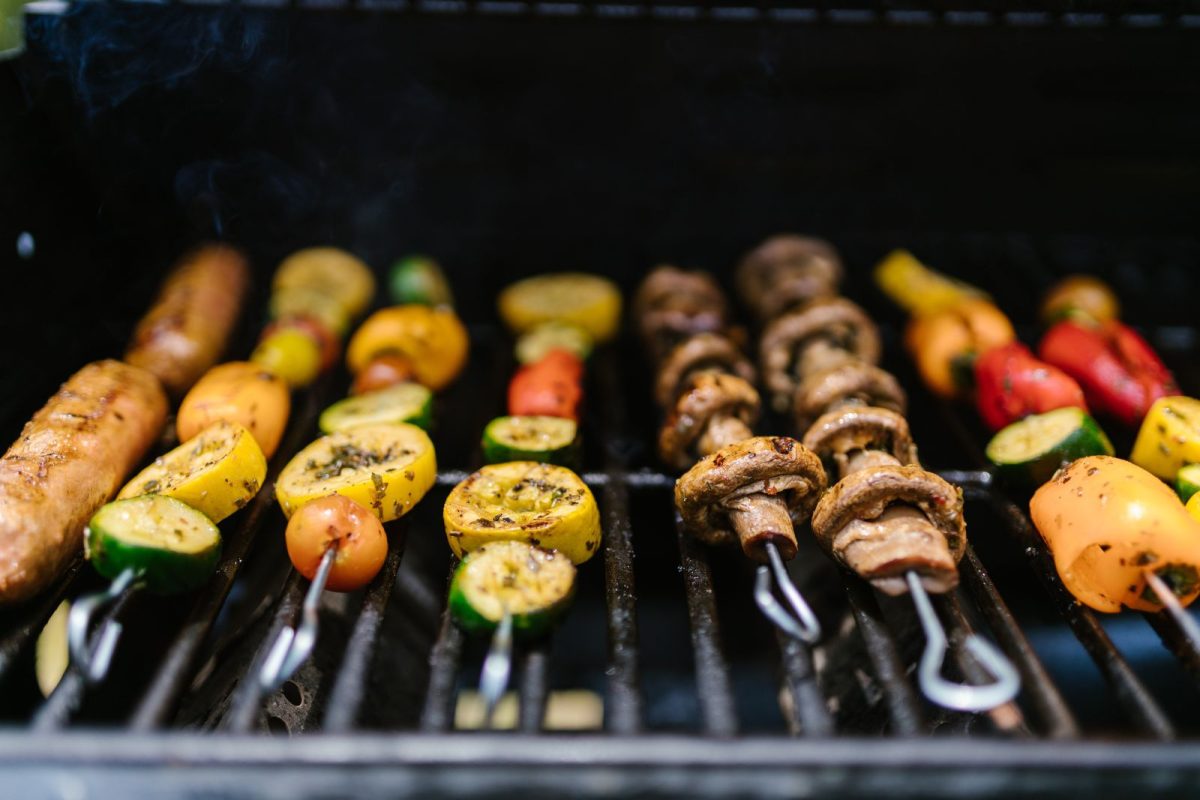 Vegetable kababs on a propane camping grill 