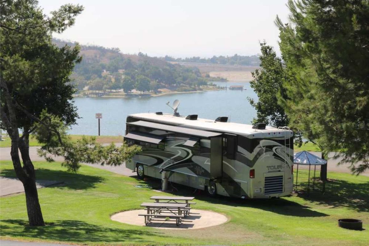 RV parked lakeside at Bonelli Bluffs RV Resort & Campground, a fall camping destination available on Campspot