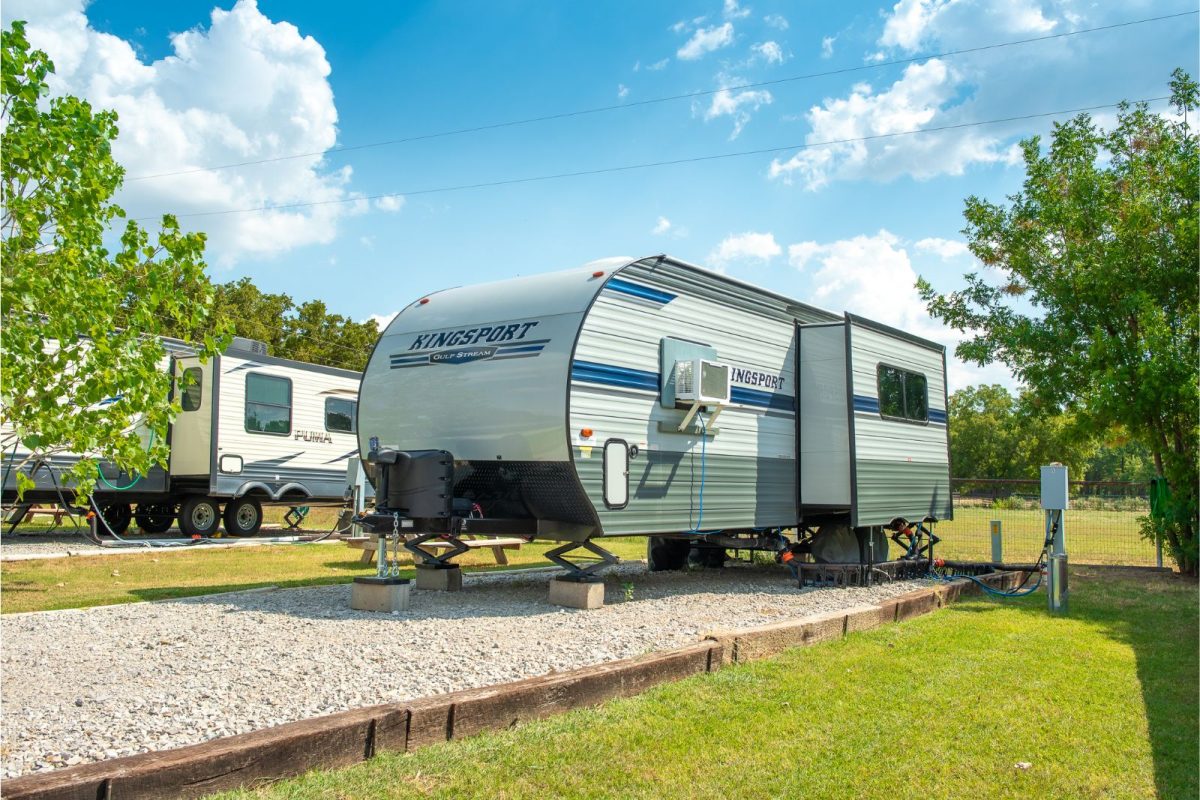 RV parked in sunny spot at Little Star RV Park, spring break camping destination