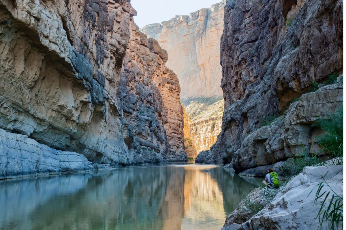 hiker at river at Big Bend National Park