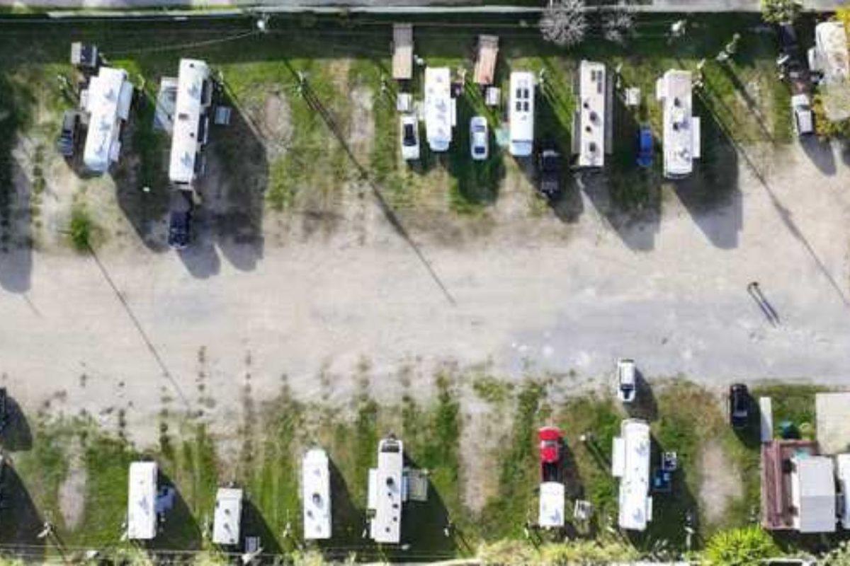 RVs parked in two rows at RV campground near Jazz Fest