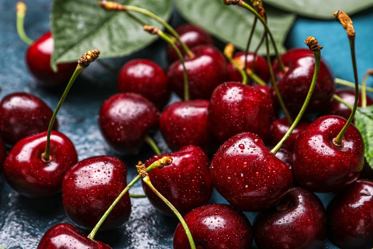 cherries glistening on table