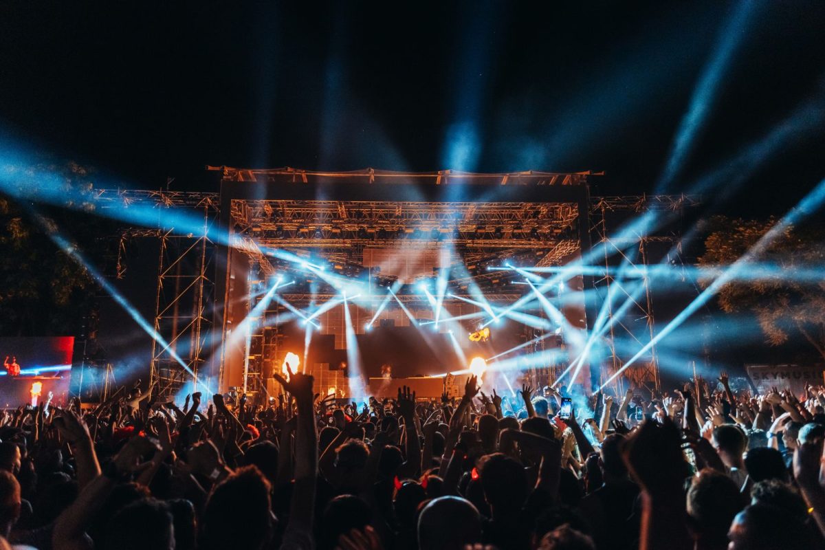 bright lights at camping event Coachella with tons of people